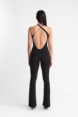 Catsuit, asimétrico, cut-out, espalda abierta,  bootcut, bambú,  sensual,  elegante,  negro,  atrevido, modelo pelo largo, fondo blanco parte de atras