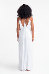 Perdita, conjunto, arneses, falda, bolsillos, top, tirantes, chiffon, transparente, modelo pelo chino, morena, fondo blanco, look completo, parte de atras.